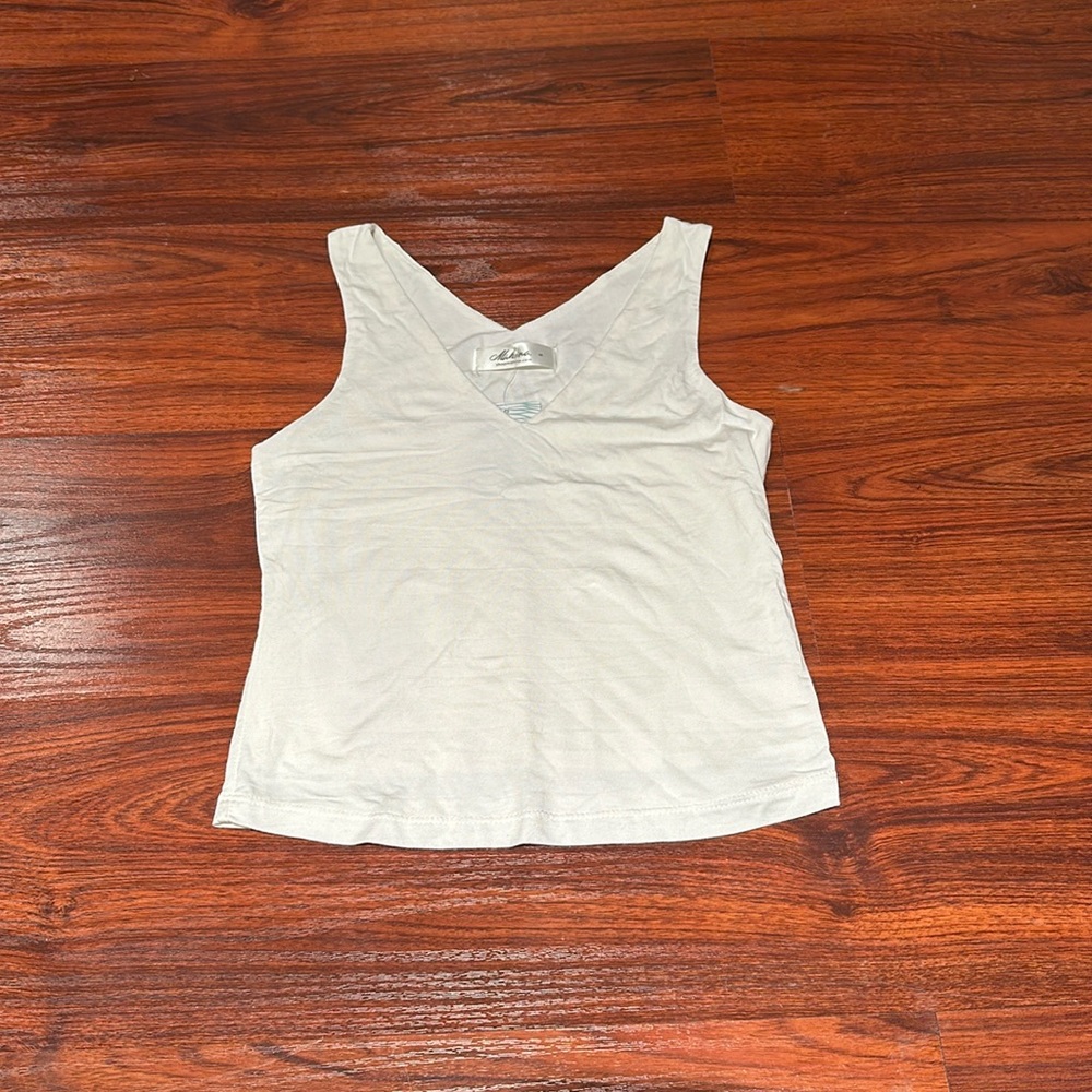 Mahina ivory V neck top